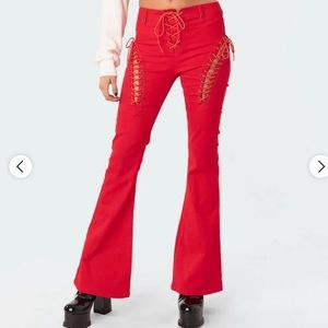 Red engine flared jeans
